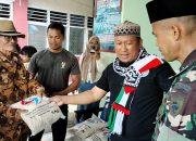 Bersama Danramil Tallo, Komunitas Pencinta Anak Yatim dan Dhuafa Bagikan Beras Gratis